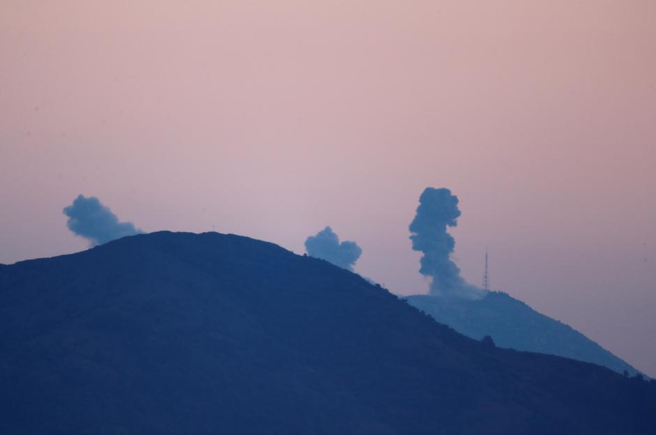 Smoke rises from the Syria's Afrin region, as it is pictured from near the Turkish town of Hassa, on the Turkish-Syrian border in Hatay province